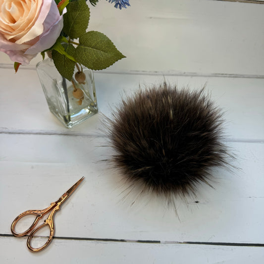 Walnut coloured faux fur pom pom