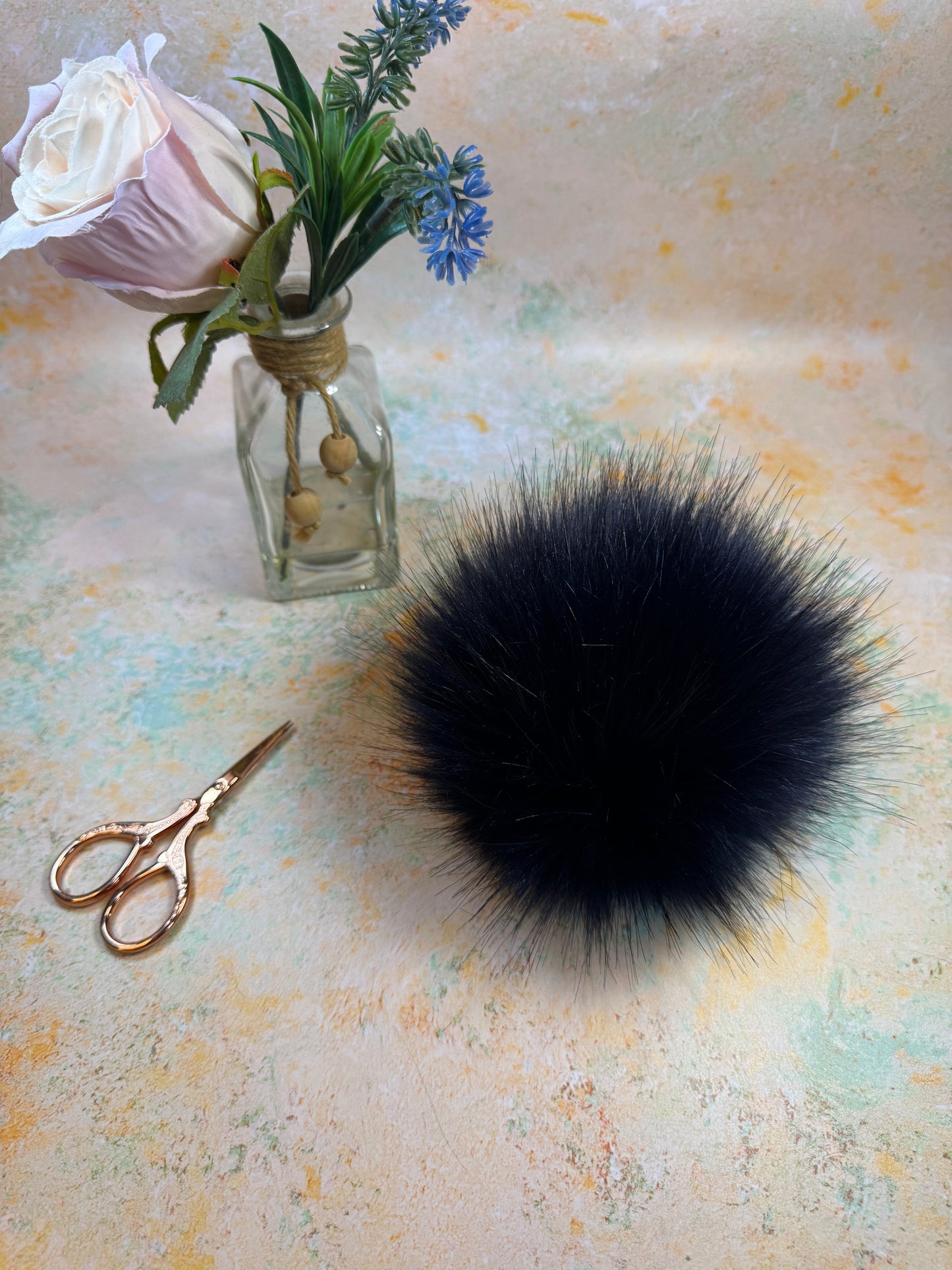 Navy handmade faux fur pom pom. Detachable option
