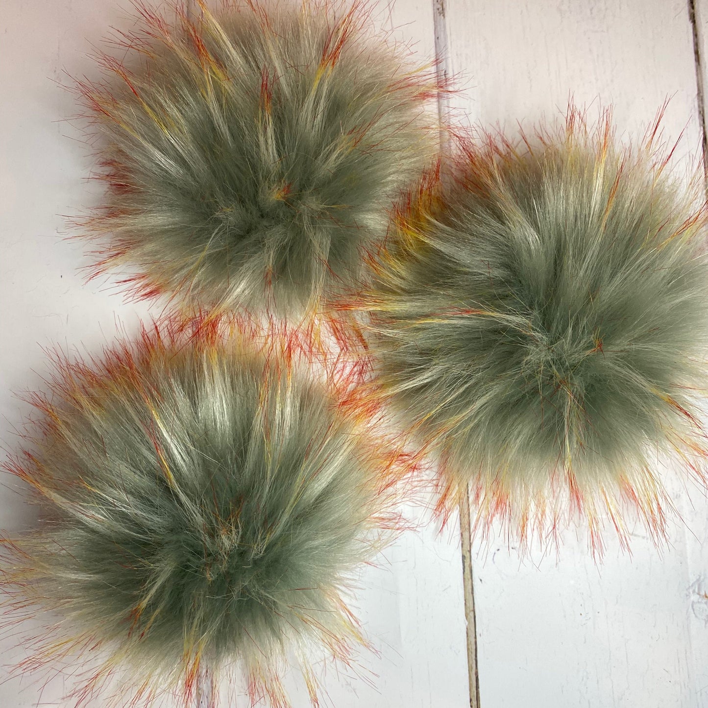 Fire & Ice coloured faux fur pom pom. Detachable option. Handmade