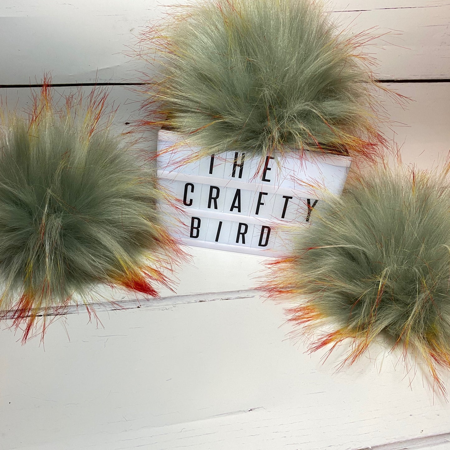 Fire & Ice coloured faux fur pom pom. Detachable option. Handmade