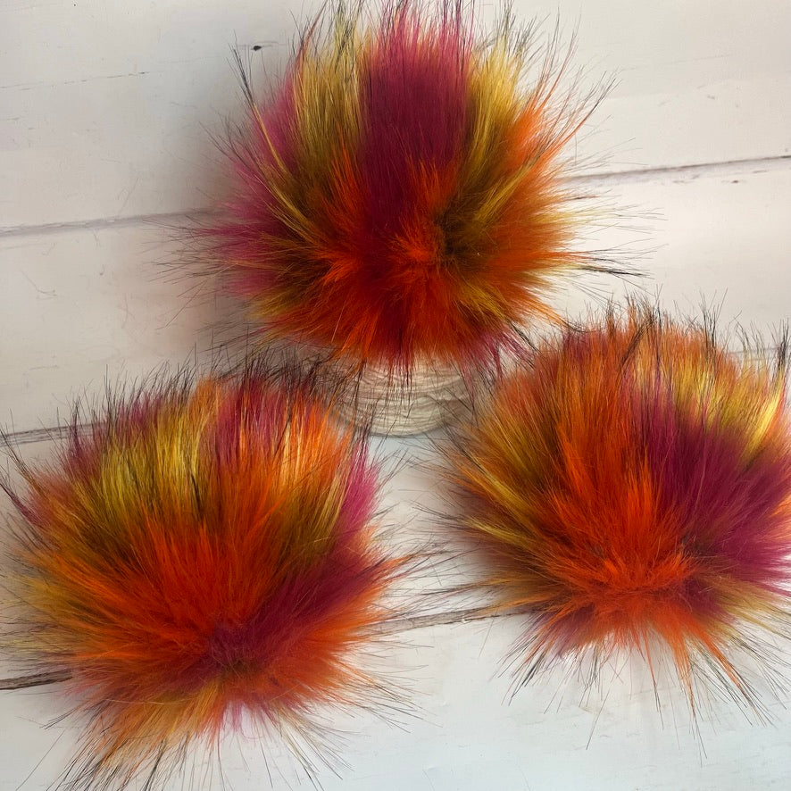 Flaming Hot coloured faux fur pom pom. Detachable option. Handmade