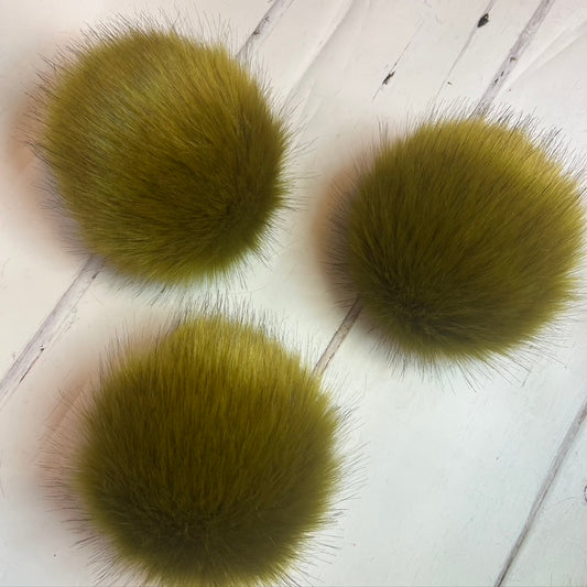 Lime coloured faux fur pom pom
