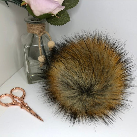 Foxy faux fur pom pom