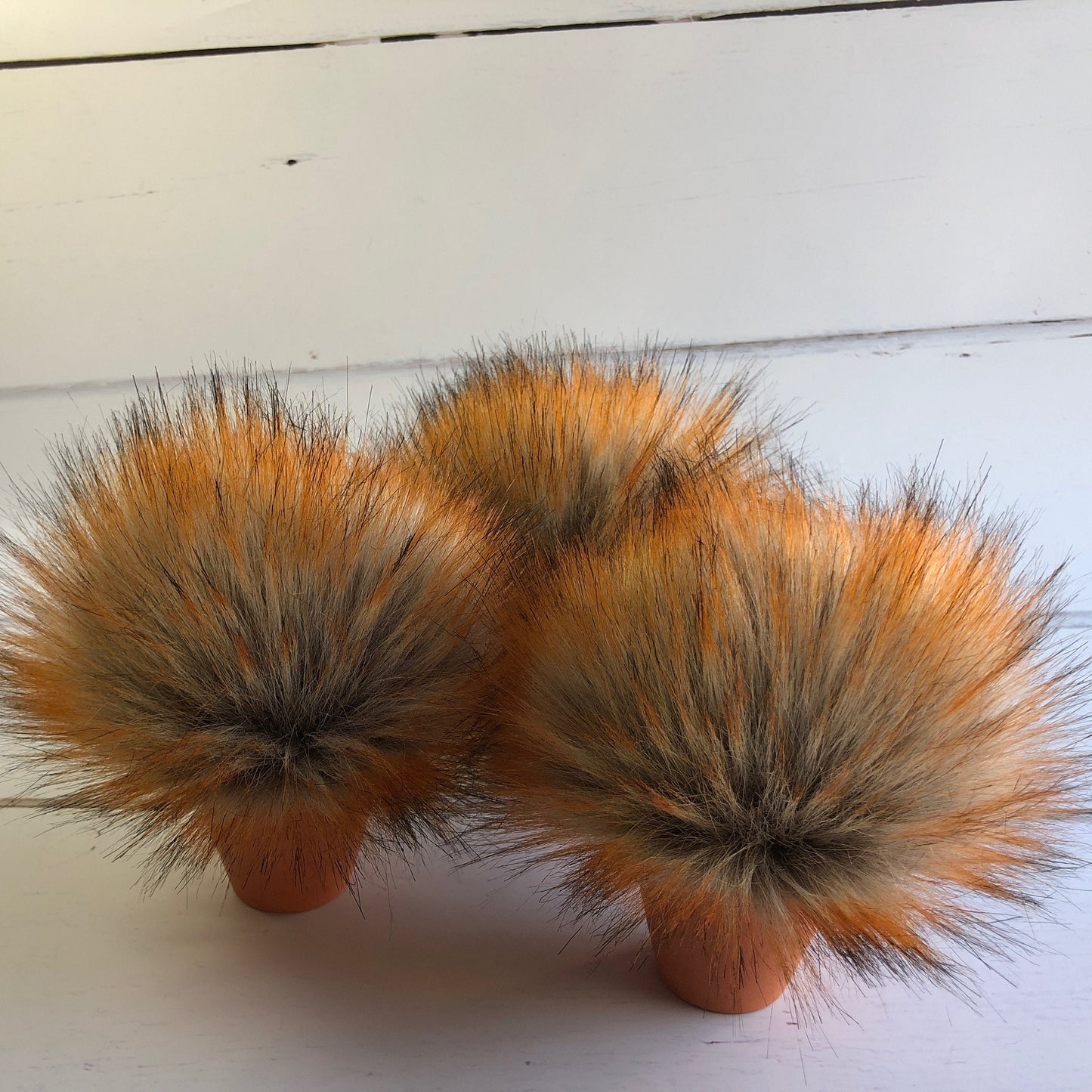 Foxy faux fur pom pom