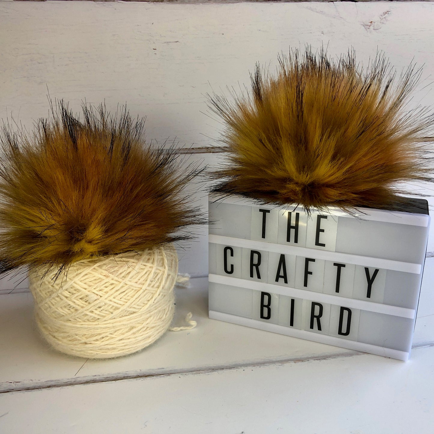 Peachy Keen faux fur pom pom