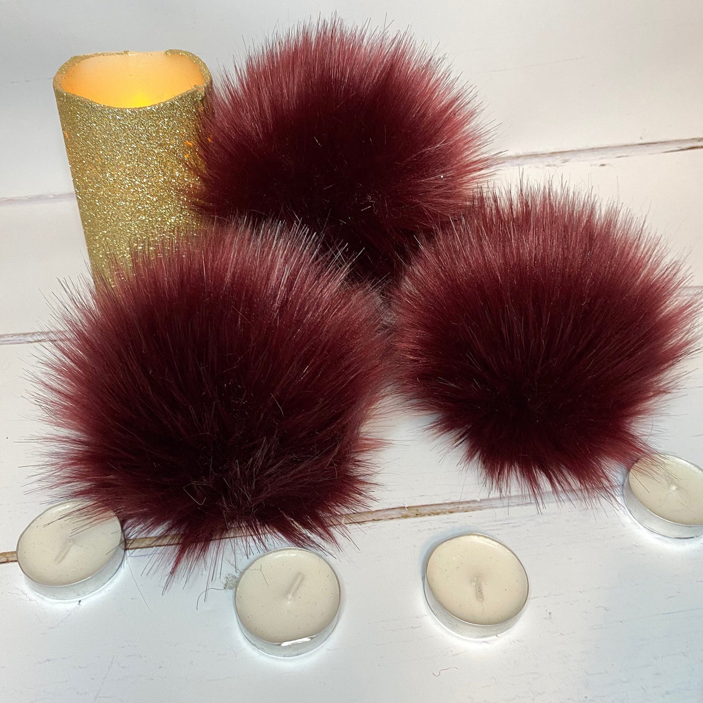Burgundy faux fur pom pom