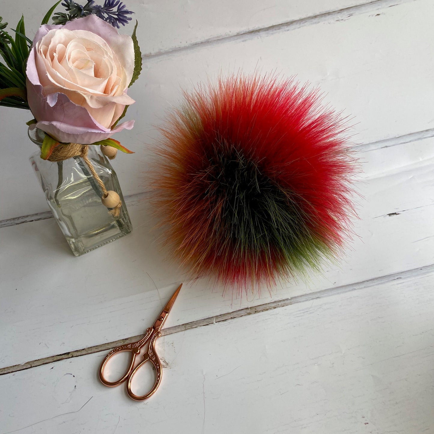 Toffee Apple handmade faux fur pom pom. Detachable option. Handmade