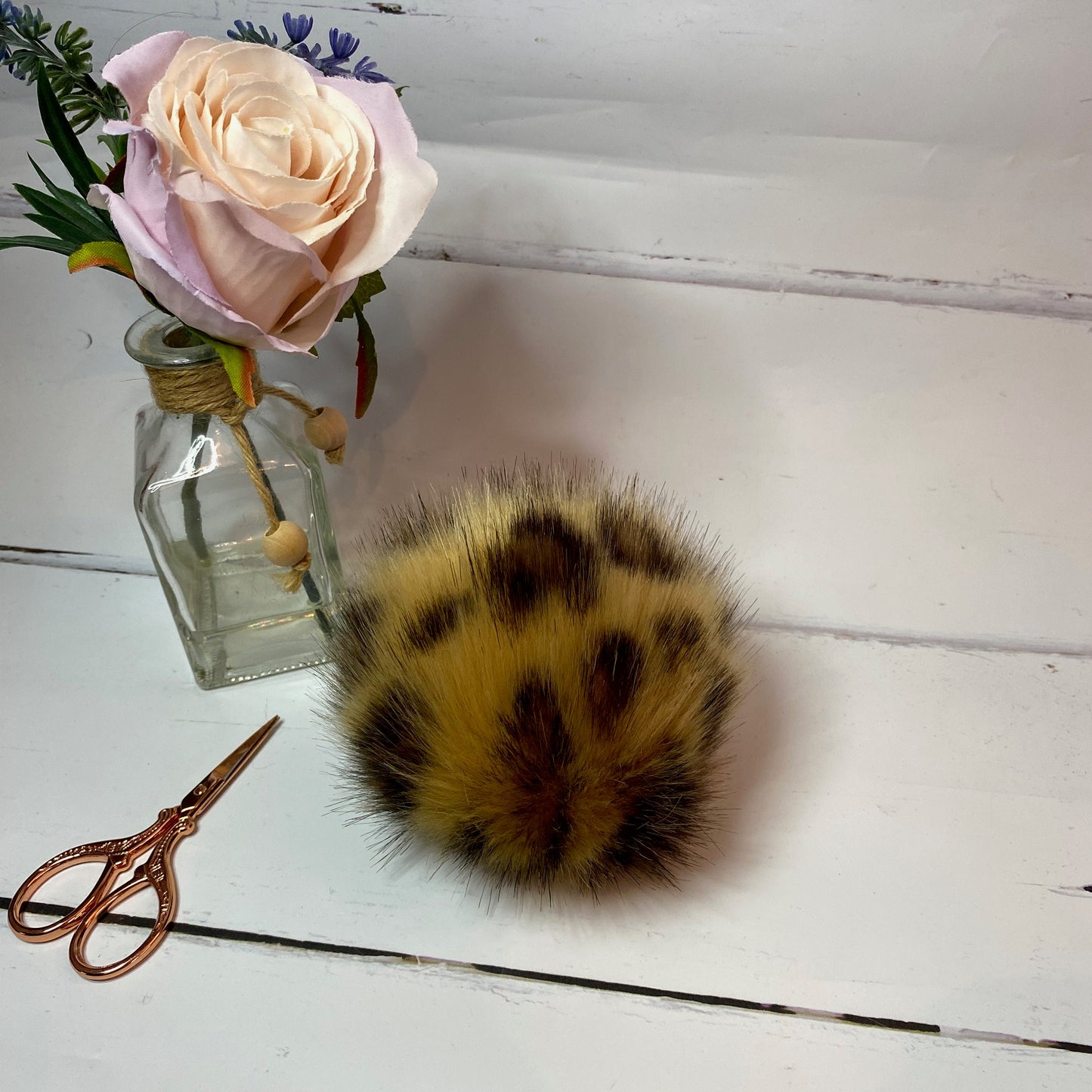Jaguar faux fur pom pom