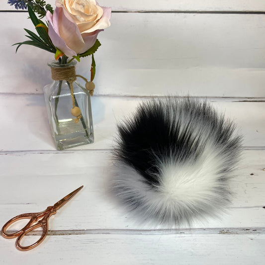 Cruella faux fur pom pom