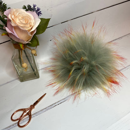 Fire & Ice coloured faux fur pom pom. Detachable option. Handmade