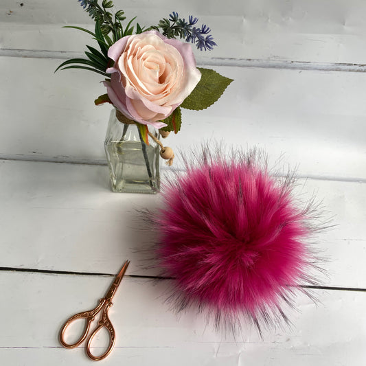 Fuchsia coloured faux fur pom pom. Detachable option. Handmade