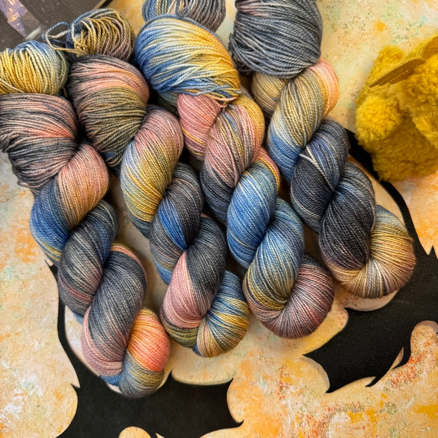 The Rooftops of Aretia Gold Sparkle Sock - Fourth Wing - Hand Dyed Yarn - NEW