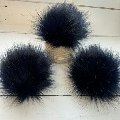 Navy handmade faux fur pom pom. Detachable option