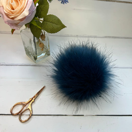 Lake coloured faux fur pom pom. Detachable option. Handmade