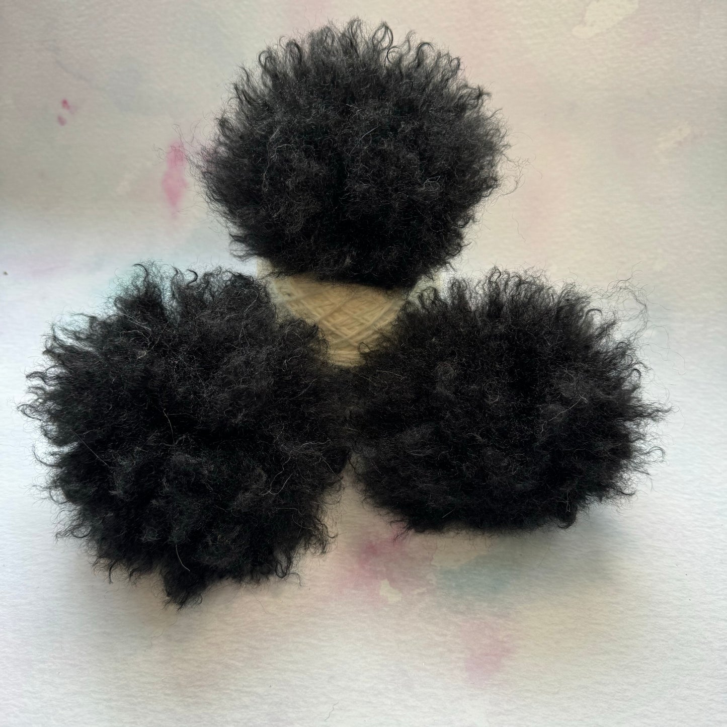 Black faux alpaca handmade faux fur pom pom. Detachable option