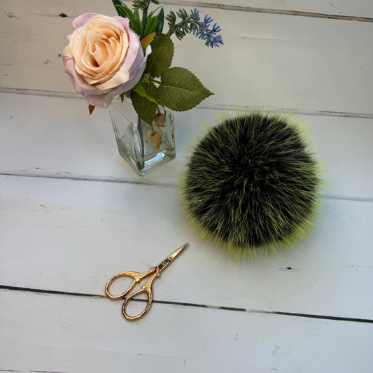 Mojito coloured faux fur pom pom. Detachable option. Handmade