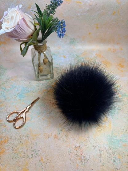 Navy handmade faux fur pom pom. Detachable option