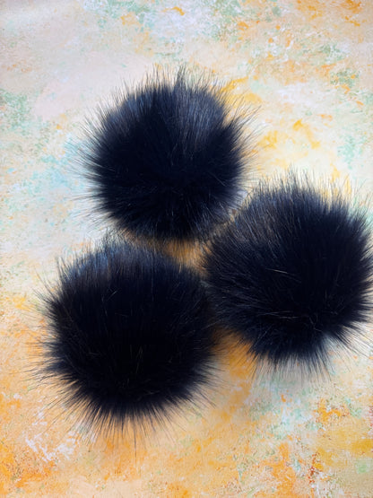 Navy handmade faux fur pom pom. Detachable option
