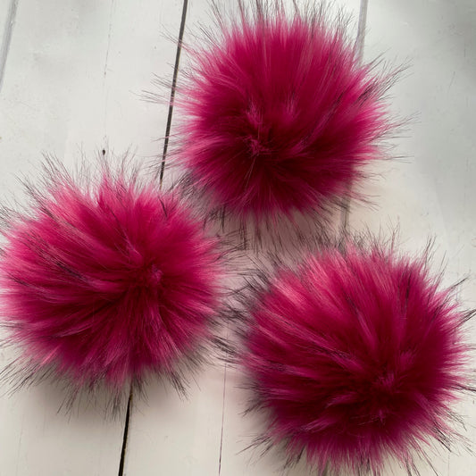 Fuchsia coloured faux fur pom pom. Detachable option. Handmade
