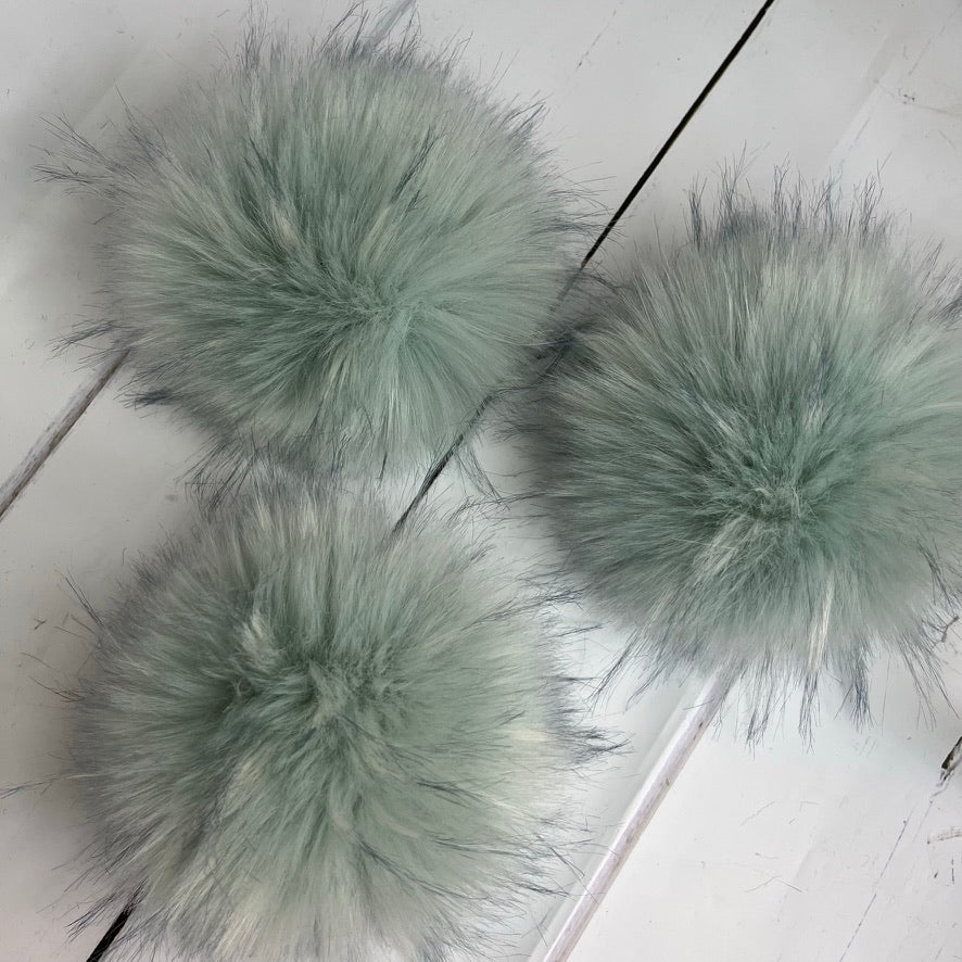 Sea Glass coloured faux fur pom pom. Detachable option. Handmade