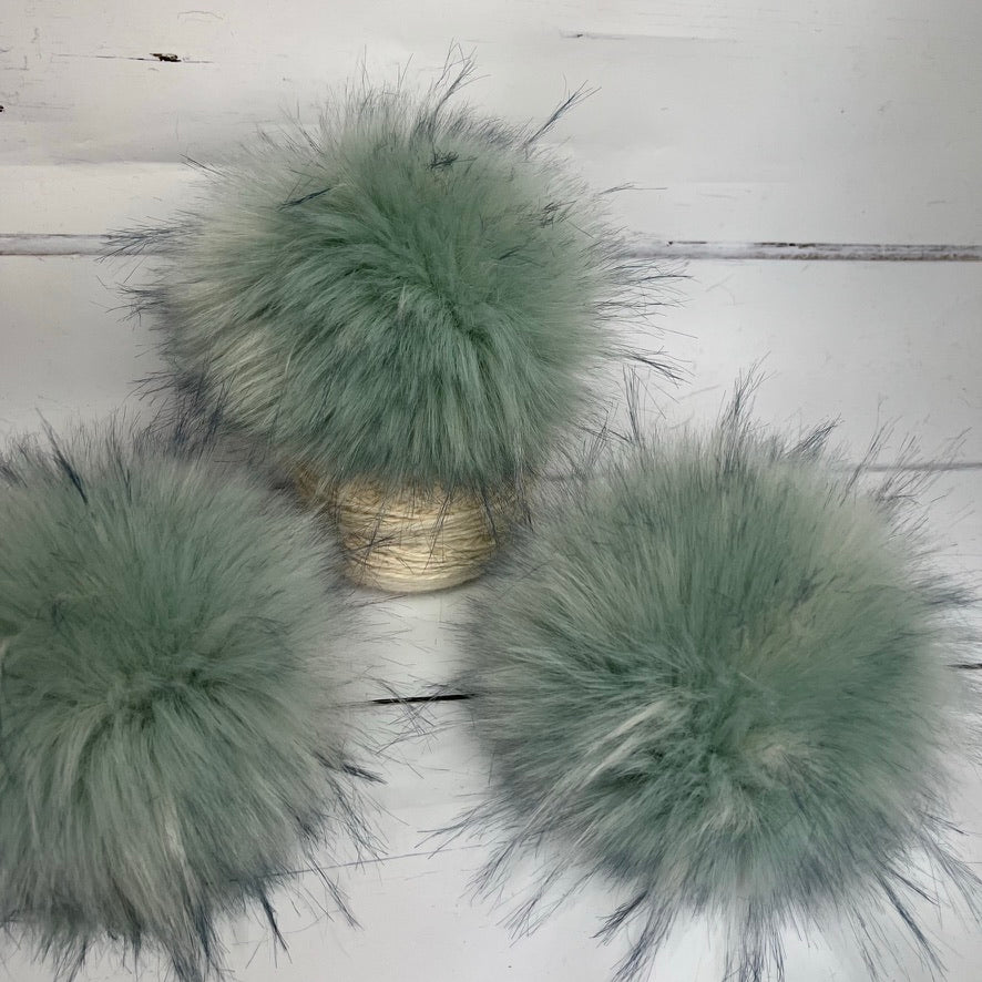 Sea Glass coloured faux fur pom pom. Detachable option. Handmade