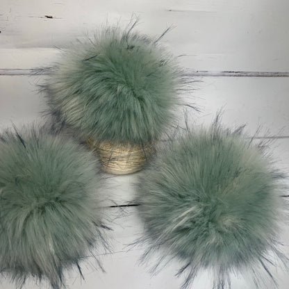 Sea Glass coloured faux fur pom pom. Detachable option. Handmade