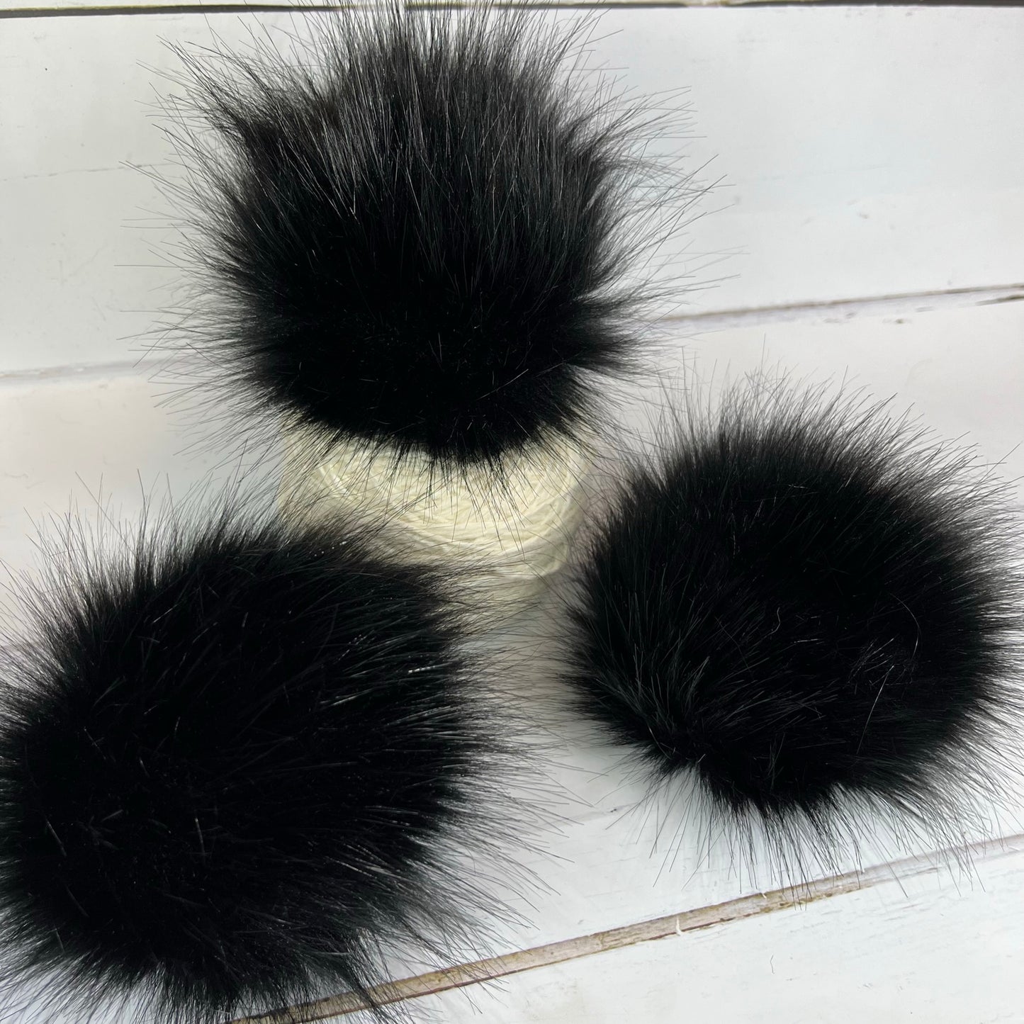 Raven handmade faux fur pom pom. Detachable option. Handmade