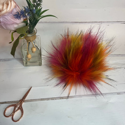 Flaming Hot coloured faux fur pom pom. Detachable option. Handmade