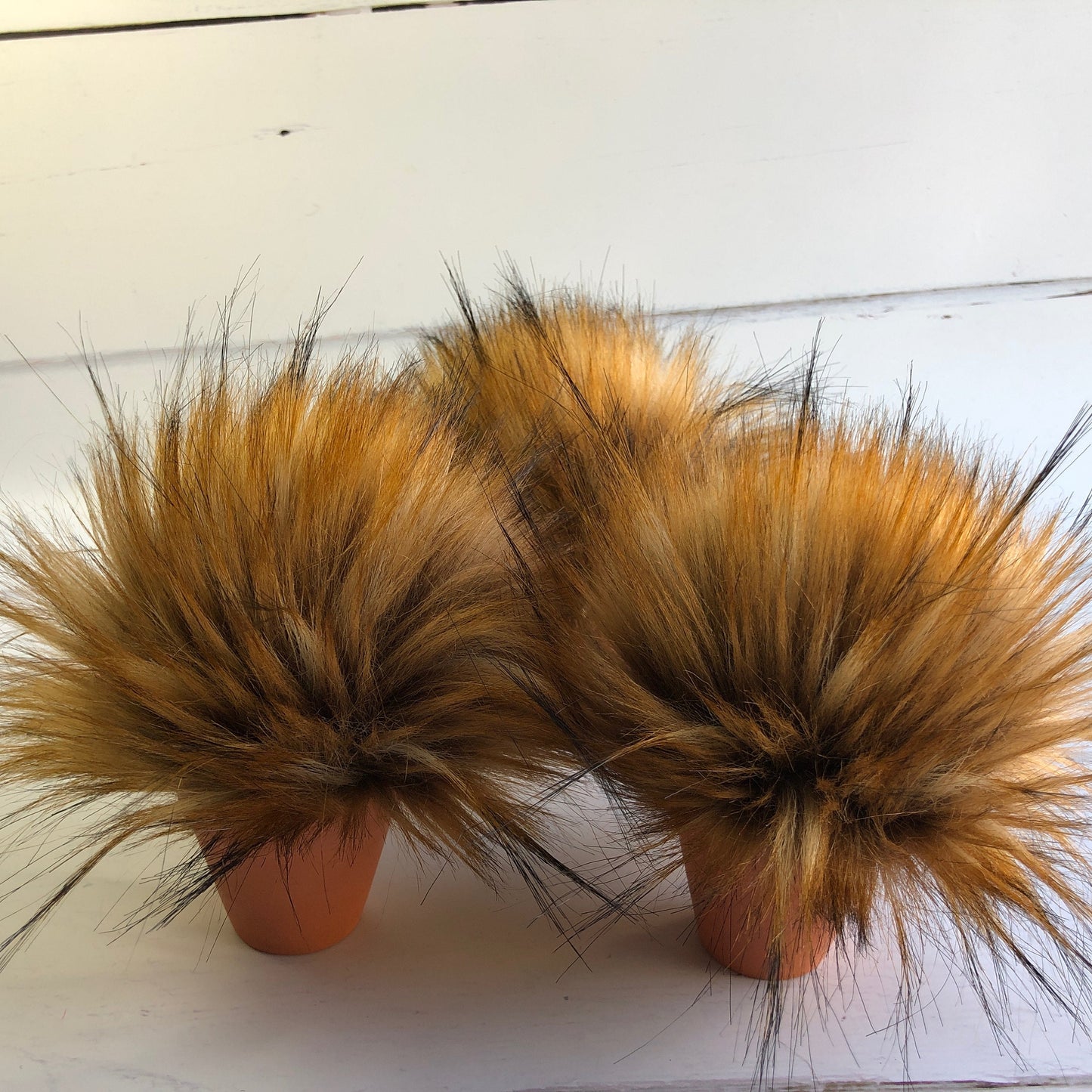 Golden brown and black tips handmade faux fur pom pom. Detachable option. Handmade