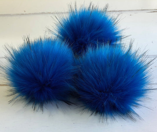 Bluebird handmade faux fur pom pom. Detachable option. Handmade