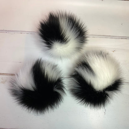 Cruella faux fur pom pom. Detachable option