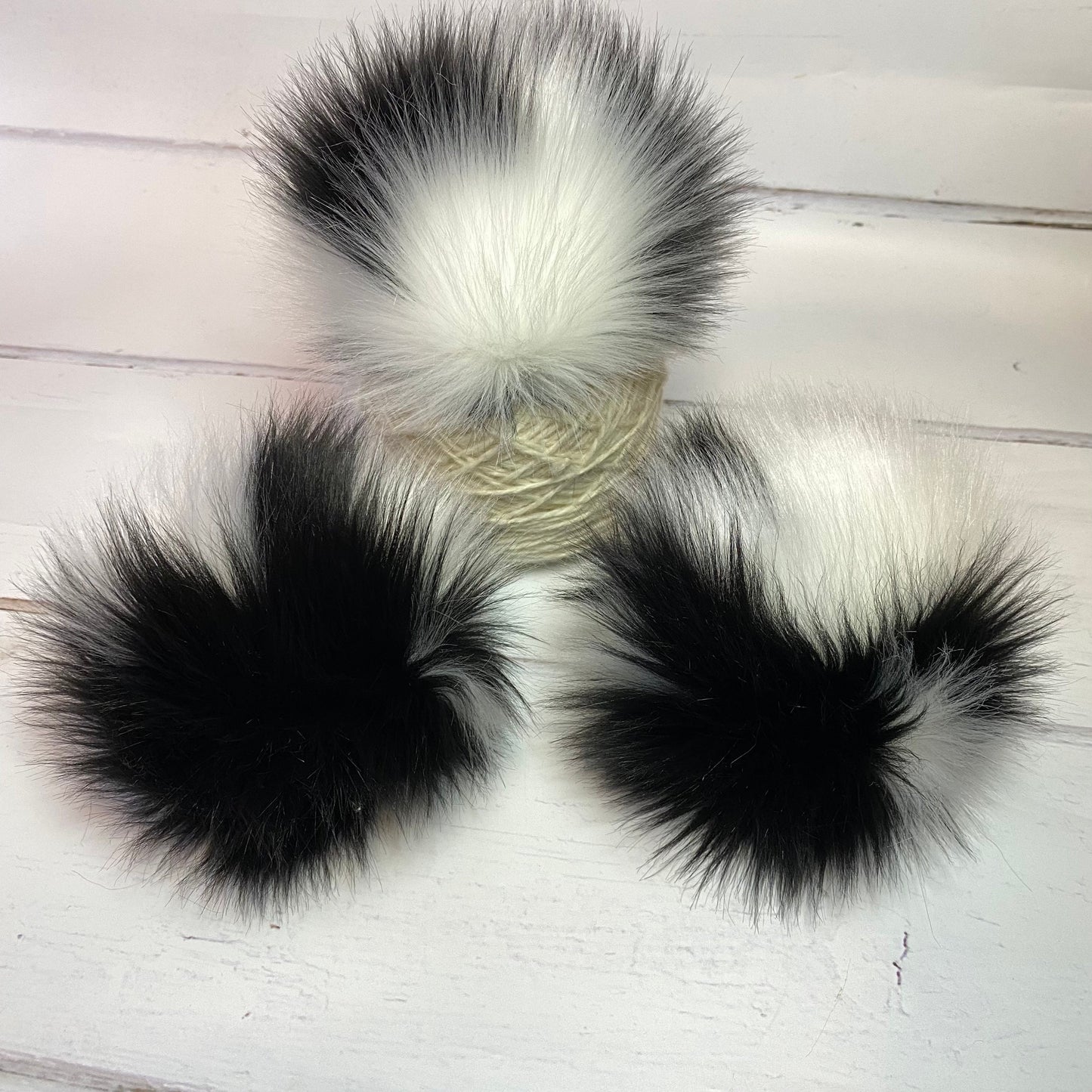 Cruella faux fur pom pom. Detachable option